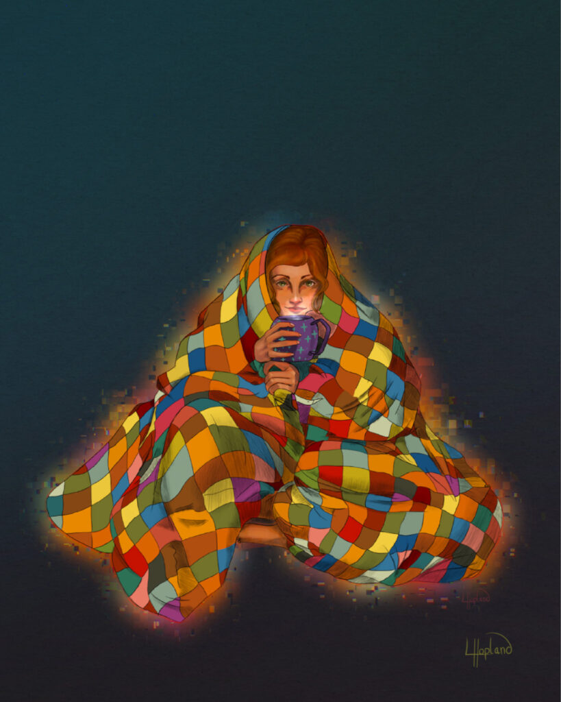 woman sitting in a cozy blanket with cup of tea